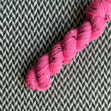 HIGHLIGHTER PINK -- Half-Skein -- Alphabet City tweed sock yarn (black/grey nep) -- ready to ship
