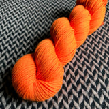 HIGHLIGHTER ORANGE -- dyed to order -- choose your yarn base