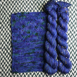 DON’T PANIC, PEACOCK -- Half-Skein -- Alphabet City tweed sock yarn (black/grey nep) -- ready to ship