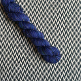 DON’T PANIC, PEACOCK -- Half-Skein -- Alphabet City tweed sock yarn (black/grey nep) -- ready to ship