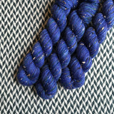 DON’T PANIC, PEACOCK -- Half-Skein -- Alphabet City tweed sock yarn (black/grey nep) -- ready to ship