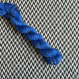 ULTRAMARINE -- Half-Skein -- Alphabet City tweed sock yarn (black/grey nep) -- ready to ship