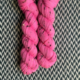 HIGHLIGHTER PINK -- Half-Skein -- Alphabet City tweed sock yarn (black/grey nep) -- ready to ship