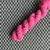 HIGHLIGHTER PINK -- Half-Skein -- Alphabet City tweed sock yarn (black/grey nep) -- ready to ship